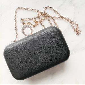 NWOT black faux leather rhinestone clutch